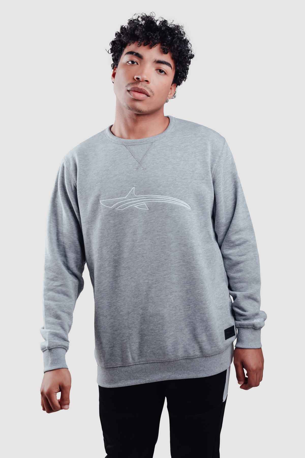 Model wearing a grey pull over sweater from oceanman - bali edition