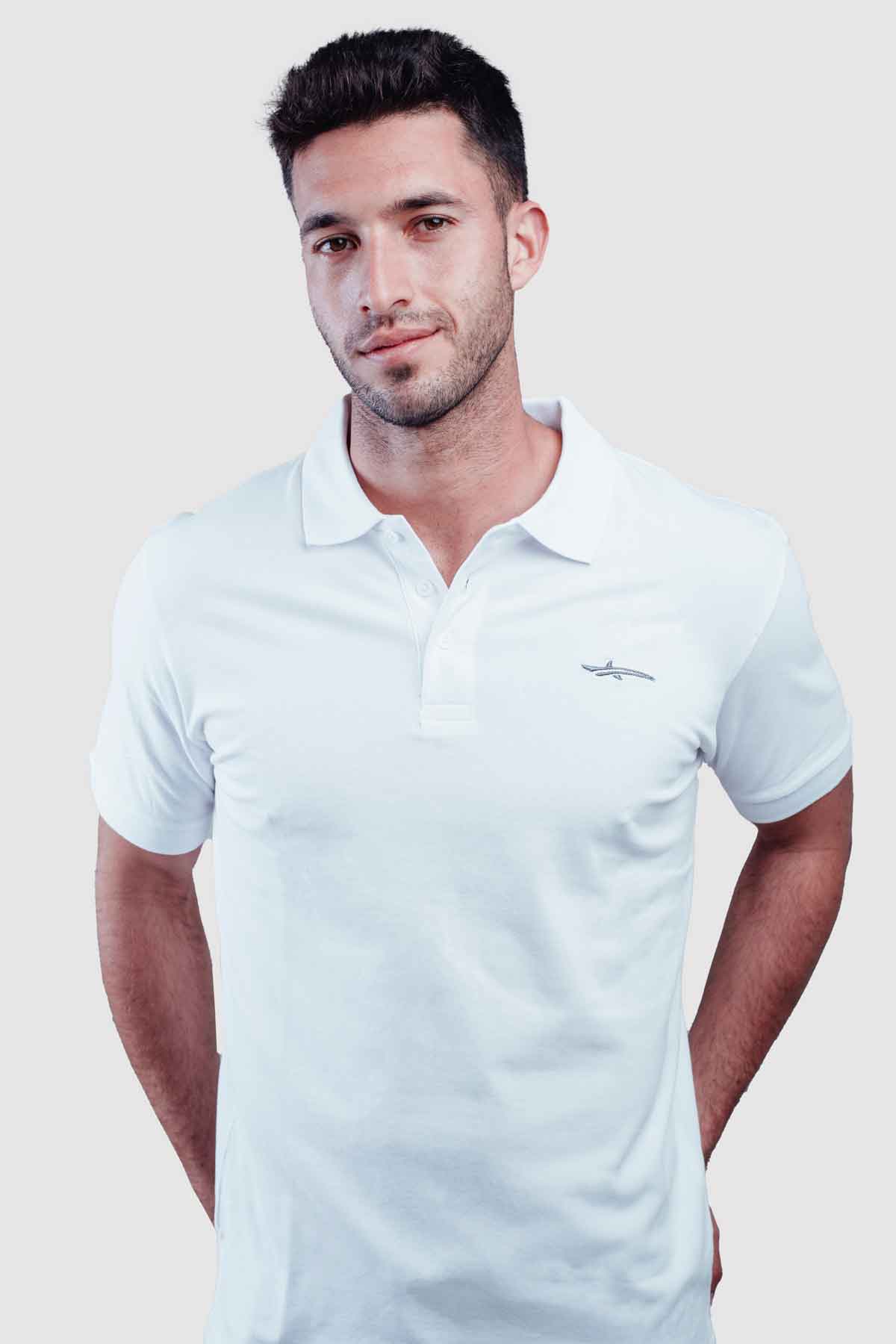 Oceanman white polo with small shark logo on chest