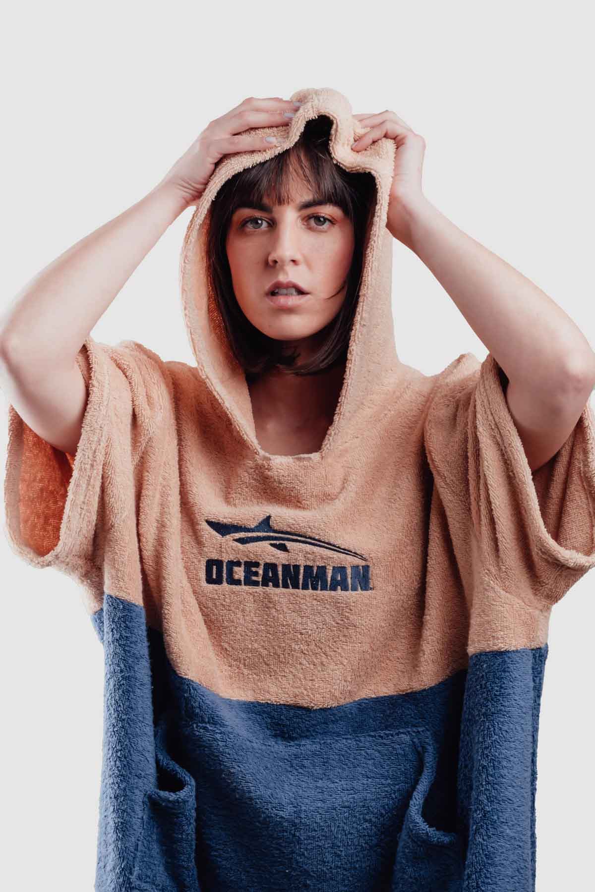 woman with poncho oceanman